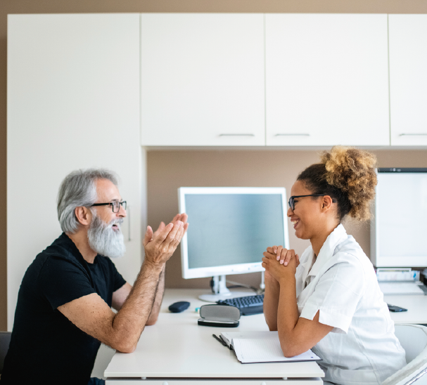 An eye specialist interviewing an applicant