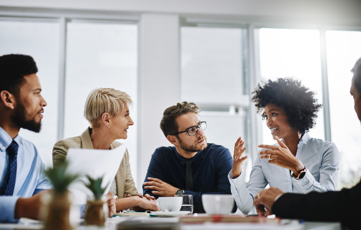 Healthcare business professionals having a round-table deliberation